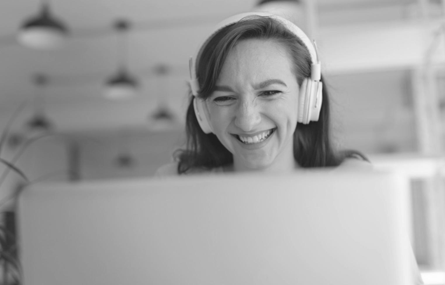 Financial charts and graphs displayed on computer screens