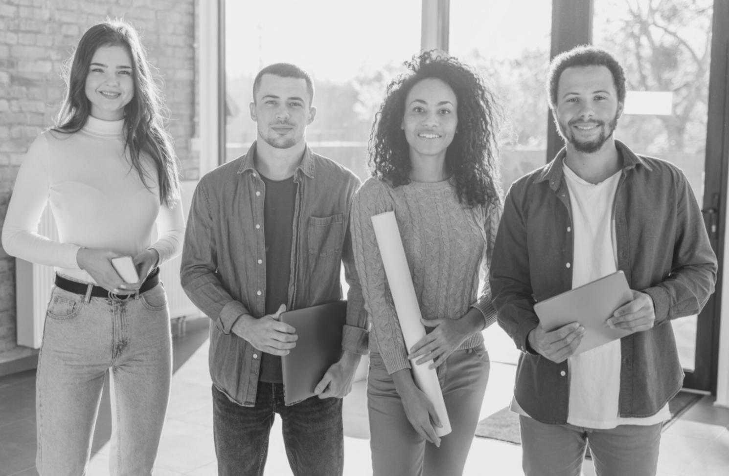 Students working on financial analysis projects in a collaborative learning environment